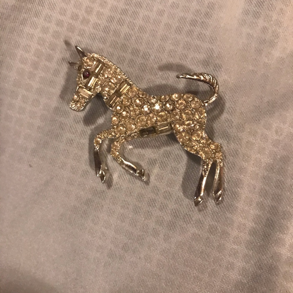 Vintage sparkle silver colored horse brooch
